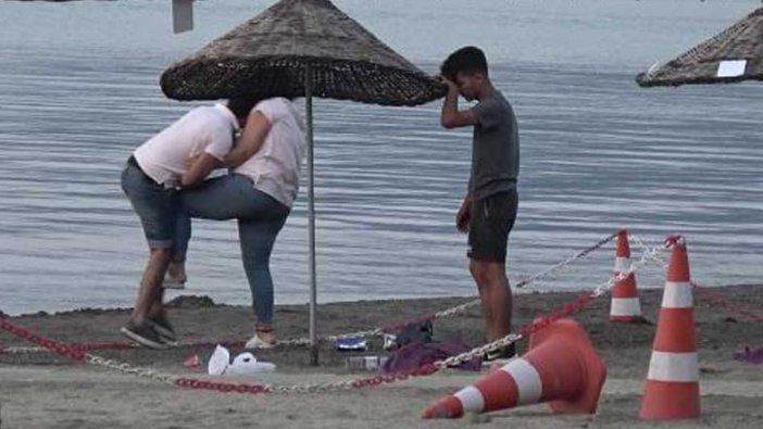 Muğla'da bir kadın ile erkek arasında plajda tekme tokat kavga